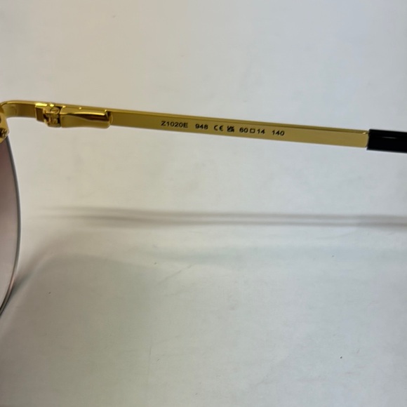 Like new women’s Louis Vuitton Gold and Brown aviator Sunglasses Reflective LV - Picture 4 of 7